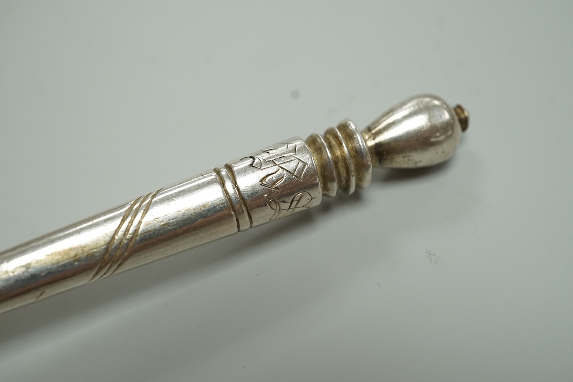 A mid 19th century Russian 84 zolotnik and niello spoon, assay master probably I. Avdyeyev, Moscow, 1857, 18cm.